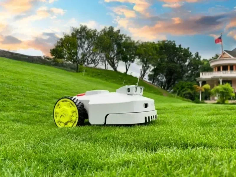 BESTMOW Titan-100 robotic lawn mower operating on grass